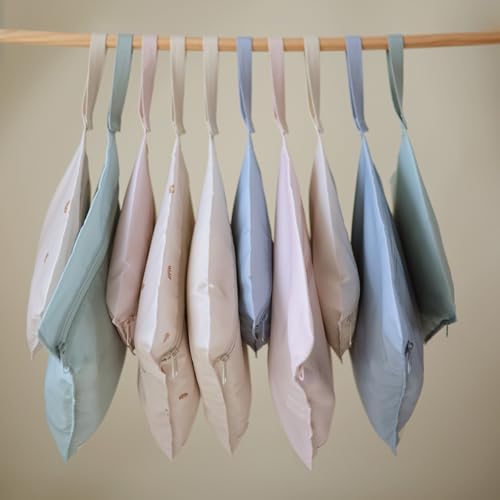 mushie Water Resistant Wet Bags | Large & Small Reusable Storage Bag for Baby Items and Travel | Zippered Pockets with Handle | Machine Washable, Set of 2 (Pastel Blooms)