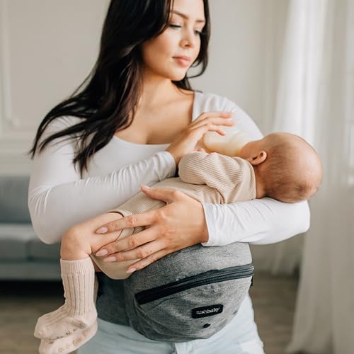 Tushbaby The Original Premium Quality Hip Seat Carrier – Safety-Certified Baby & Toddler Carrier with Secure Safety Buckles, No-Flimsy-Foam Design, Storage Pockets & Nursing Pillow. 0–3 yrs