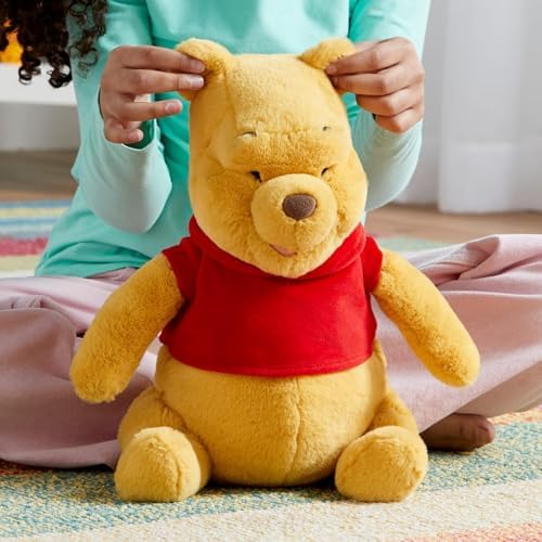 DISNEY STORE Official Pooh Medium Soft Toy for Kids, Cuddly Character with Fuzzy Texture and Embroidered Details, Red T-Shirt, Disney Plushy Suitable for All Ages.