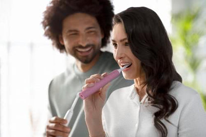 Philips Sonicare 4100 Rechargeable Electric Toothbrush, with Pressure Sensor, 2 Intensity Settings, SmarTimer and QuadPacer, 14-Day Battery Life, Deep Pink, Model HX3681/26