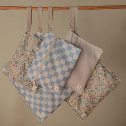 mushie Water Resistant Wet Bags | Large & Small Reusable Storage Bag for Baby Items and Travel | Zippered Pockets with Handle | Machine Washable, Set of 2 (Pastel Blooms)