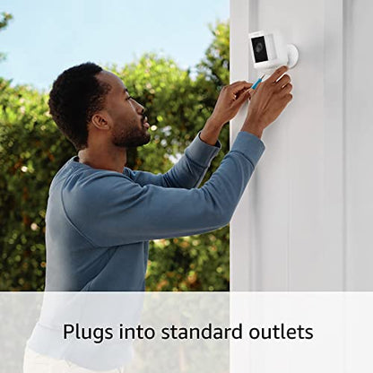 Like-New Ring Spotlight Cam Plus, Plug-In | Home or business security with HD video, Two-Way Talk, Color Night Vision, and Security Siren (2022 release) - White