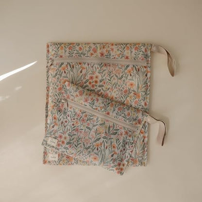 mushie Water Resistant Wet Bags | Large & Small Reusable Storage Bag for Baby Items and Travel | Zippered Pockets with Handle | Machine Washable, Set of 2 (Pastel Blooms)